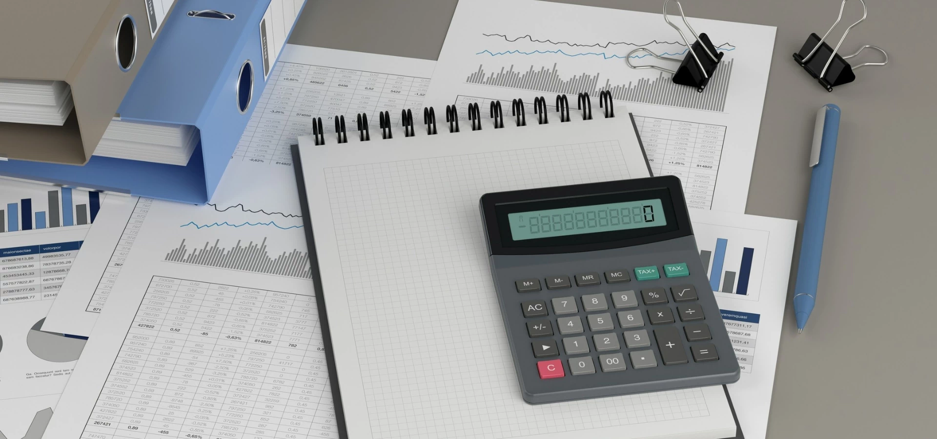 Kalkulator leżący na dokumentacji rachunkowej